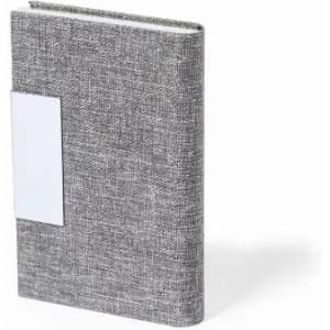 A grey fabric-covered notebook featuring a blank label space on the front.