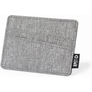 A grey card holder made from recycled materials, featuring two slots for cards and a branding label.
