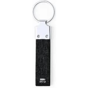 A keyring with a black fabric strap and a metal loop, featuring a small branding logo.
