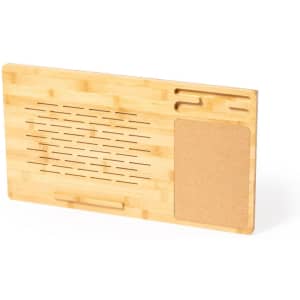 A bamboo cutting board featuring slotted sections and a cork area, with a natural wood finish.