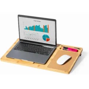 A laptop on a bamboo desk tray with graphs displayed, featuring a mouse, pen, and highlighter.