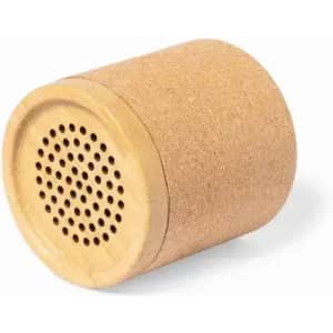 A cylindrical cork speaker in a light beige colour with a perforated grill on top. It features a simple design.