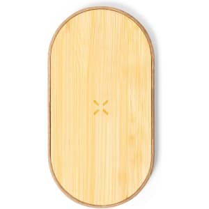 A wooden serving board with a smooth bamboo surface and rounded edges, featuring a subtle engraved logo in the centre.