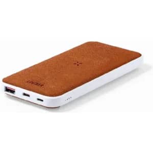 A power bank with a brown suede-like finish and a white base, featuring multiple charging ports.
