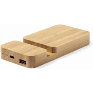 A bamboo charging station featuring a USB port and a slot for a device. The design is sleek and minimalistic.