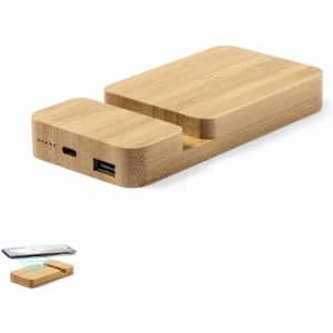 A wooden charging dock in a natural finish, featuring a USB port and a slot for a smartphone.