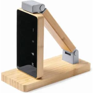 A desk lamp with a wooden arm, metal joints, and a black rectangular lampshade on a bamboo base.