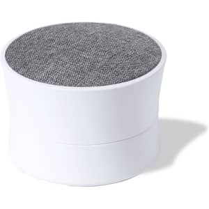 A round white speaker with a grey fabric top, featuring a smooth base and a minimalist design.