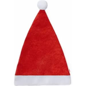 A red Christmas hat with a fluffy white trim and a white pom-pom on top.