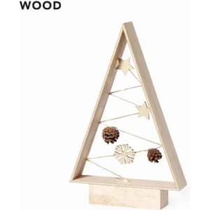 A wooden decorative Christmas tree with stars and pine cones. The tree has a minimalist design and a natural finish.