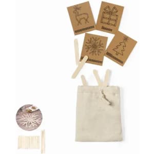 Craft kit featuring wooden sticks and cards with festive designs, all in a small fabric pouch.