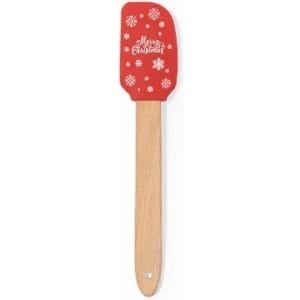 A spatula with a red silicone head featuring a festive design and a wooden handle.