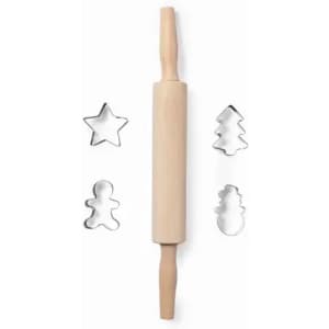 A wooden rolling pin with two handles, accompanied by metal cookie cutters in the shapes of a star, tree, and snowman.