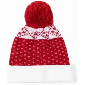 A red knitted beanie with a white patterned design and a fluffy pom-pom on top. It features a turned-up white cuff.