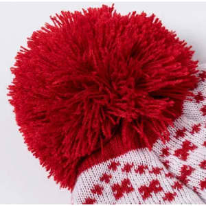 A pair of red and white patterned socks featuring a large red pom-pom on top.