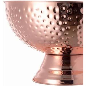 A decorative bowl with a polished copper finish and a textured, dimpled surface.