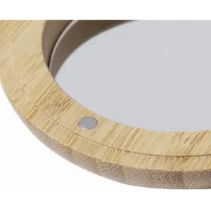 A round mirror with a bamboo frame, featuring a metallic fixing point on the edge.