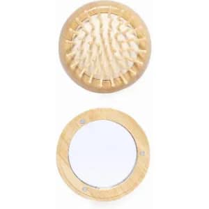 A wooden hairbrush with rounded bristles on top and a circular mirror with a wooden frame below.
