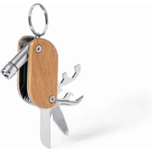A multi-tool with a wooden body, featuring a knife, file, and other metal tools, attached to a keyring.