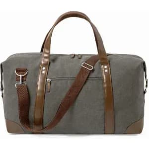 A duffel bag in grey with brown leather accents and handles, featuring a detachable shoulder strap and a front pocket.