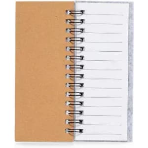 A notebook with a brown kraft cover and spiral binding, containing lined pages inside.