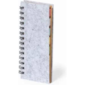 A notebook with a grey textured cover and spiral binding, featuring colourful tabs along the side.