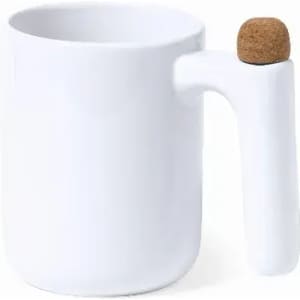 A white mug featuring a cork accent on the handle, providing a unique design element.