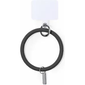 A key ring in black with a silver attachment and a small tag. It has a simple, circular design.