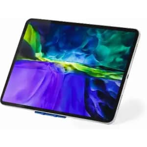 A tablet with a vibrant, multi-coloured screen displaying abstract imagery. The device is positioned at an angle.