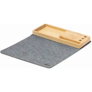 A desk mat featuring a grey felt surface and a wooden tray for holding small items or stationery.