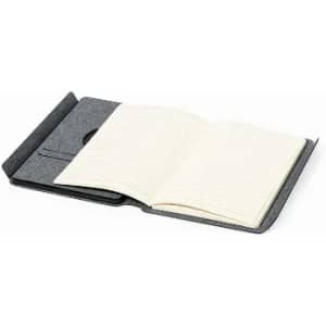 A notebook with a grey cover, featuring blank pages and an open design for easy writing.