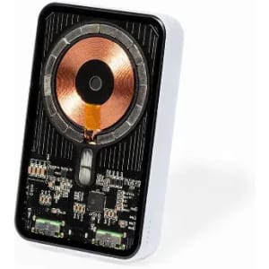A charging pad featuring a circular copper coil on a black and white base, with visible circuit components.