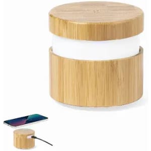 A cylindrical device made of bamboo, featuring a white interior and a cable next to a smartphone. It has a logo.