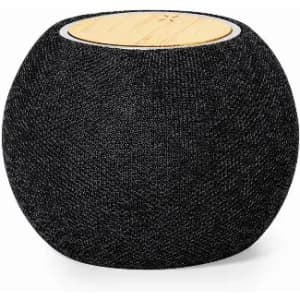 A round black stool featuring a textured fabric exterior and a wooden top. It has a minimalist design and a logo.