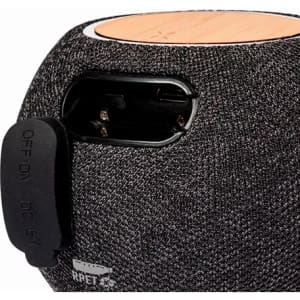 A drink bottle in grey fabric with a bamboo lid and a black cap, featuring a logo on the side.