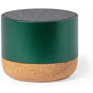 A green and cork speaker with a rounded design and a textured top surface. It features a branding logo.