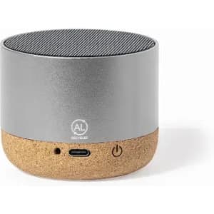 A portable speaker featuring a silver top and a cork base, with a logo and USB-C port on the side.