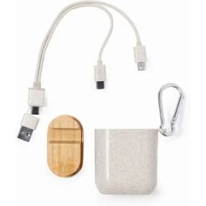 A set of eco-friendly charging accessories, including a USB cable, a rounded container, and a wooden keychain clip.