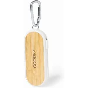 A small keychain item with a wooden and white design, featuring a carabiner and a logo on the front.