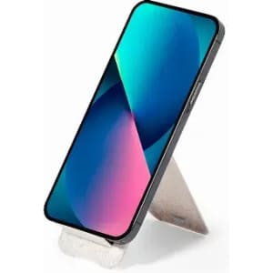 A smartphone with a vibrant blue and pink display, resting on a silver stand, featuring a sleek black frame.