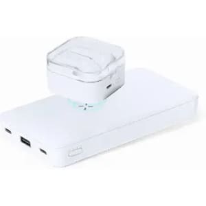 A white power bank with a transparent lid featuring wireless earbuds on top. It has multiple charging ports.