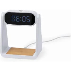 A digital alarm clock with a white frame and bamboo base, displaying the time in blue digits. It includes a power cord.