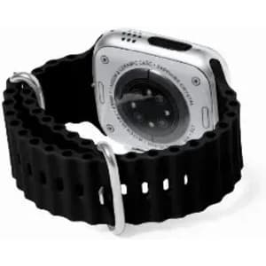 A smartwatch with a black silicone strap, featuring a silver back with visible sensors and a logo.