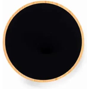 A round black coaster with a wooden rim, featuring a smooth surface and a natural bamboo border.