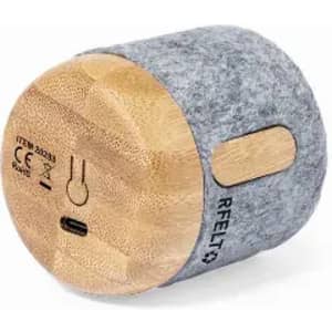 A cylindrical product featuring a grey felt exterior and a natural wood accent, with a USB-C port and branding.