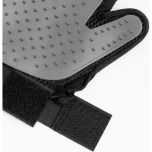 A pair of grey training gloves featuring textured grips and a black Velcro strap for secure fitting.