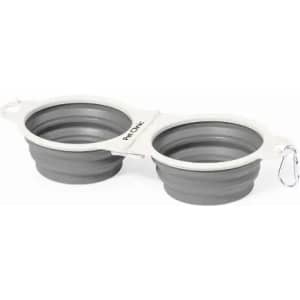 A drink bottle holder featuring two grey, collapsible cups connected by a white frame, complete with a clip.