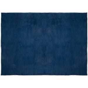 A navy blue rug featuring a ribbed texture, rectangular shape, and a solid pattern. It has an understated elegance.