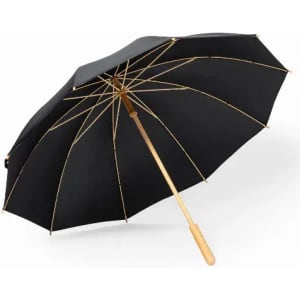 A black umbrella with a wooden handle and golden spokes, featuring a simple, elegant design.