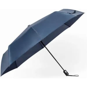 A navy blue umbrella with a sleek design and a black handle, featuring a logo on the canopy.